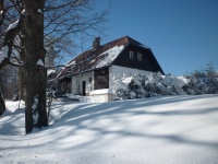 Cottage in the Bohemian forest in winter