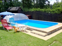 Chalet Orlík lake - garden with swimming pool